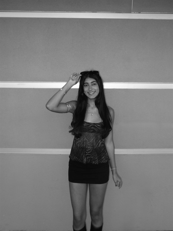 Aashvi posing indoors with sunglasses
